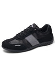 Black German Trainer shoes with grey accents, featuring the brand name "TEPOR" and a distinctive logo on the side, displayed against a white background.