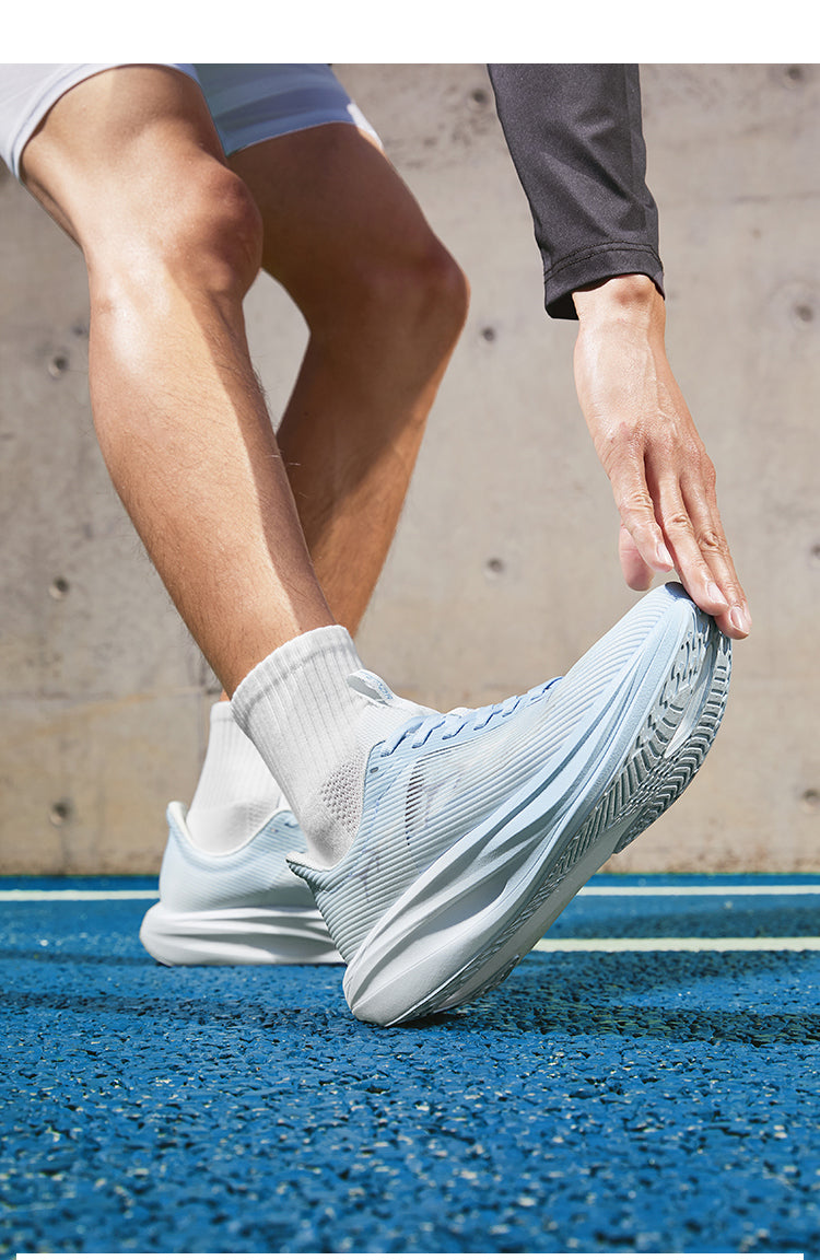 Side view of the TEFOR GoldenArmor CarbonRace Series X sneaker: integrated knit upper, gold half-length carbon plate, 3D biomechanical arch, and TEPOR-WAVE energy-return midsole.
