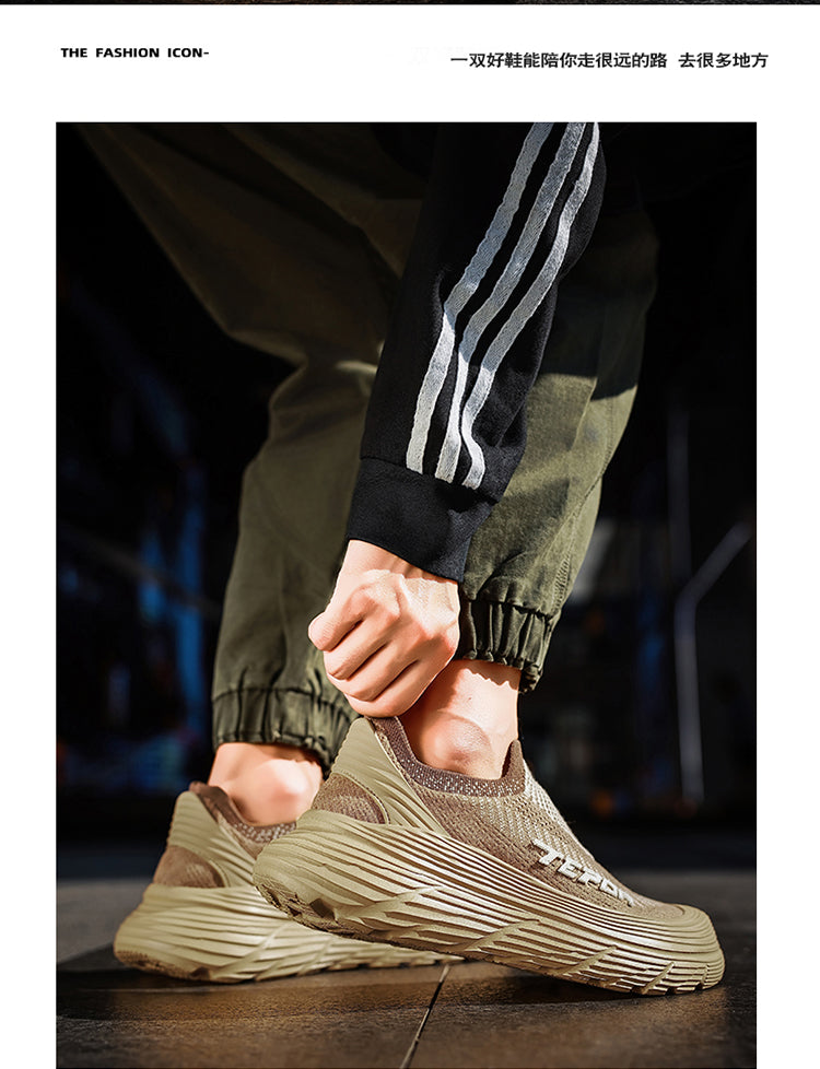 A person wearing brown casual sports shoes, with one hand adjusting the shoe, showcasing the shoes' design and fit when worn.
