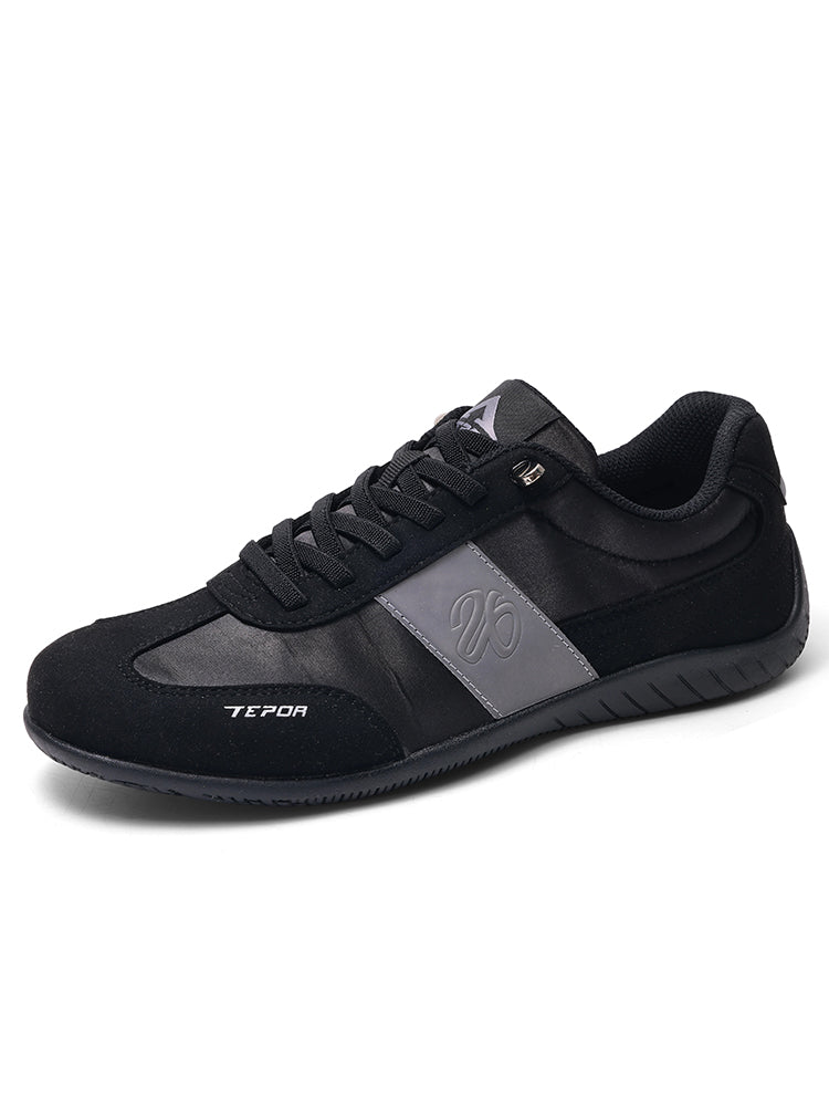 Black German Trainer shoes with grey accents, featuring the brand name "TEPOR" and a distinctive logo on the side, displayed against a white background.
