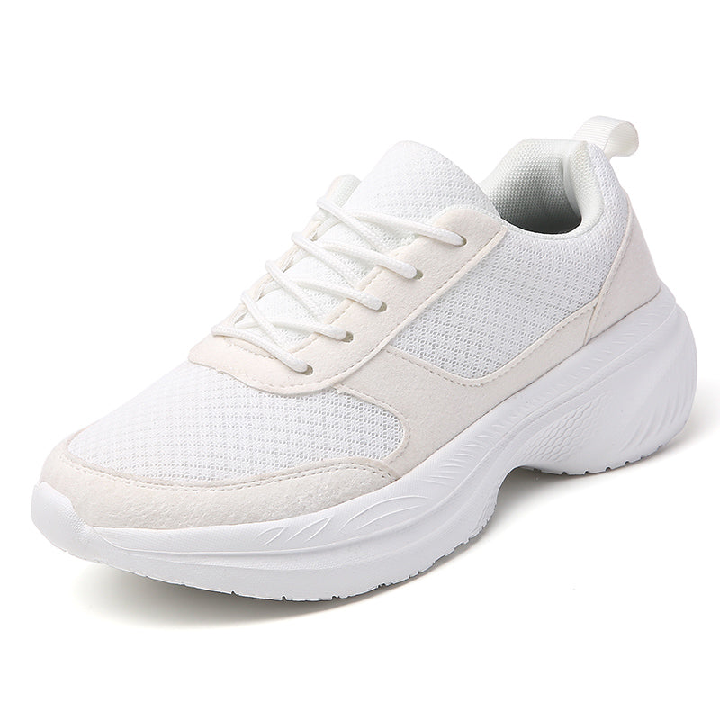 White sports shoes with a breathable mesh upper, lace - up design, and a thick white sole, displayed against a white background.