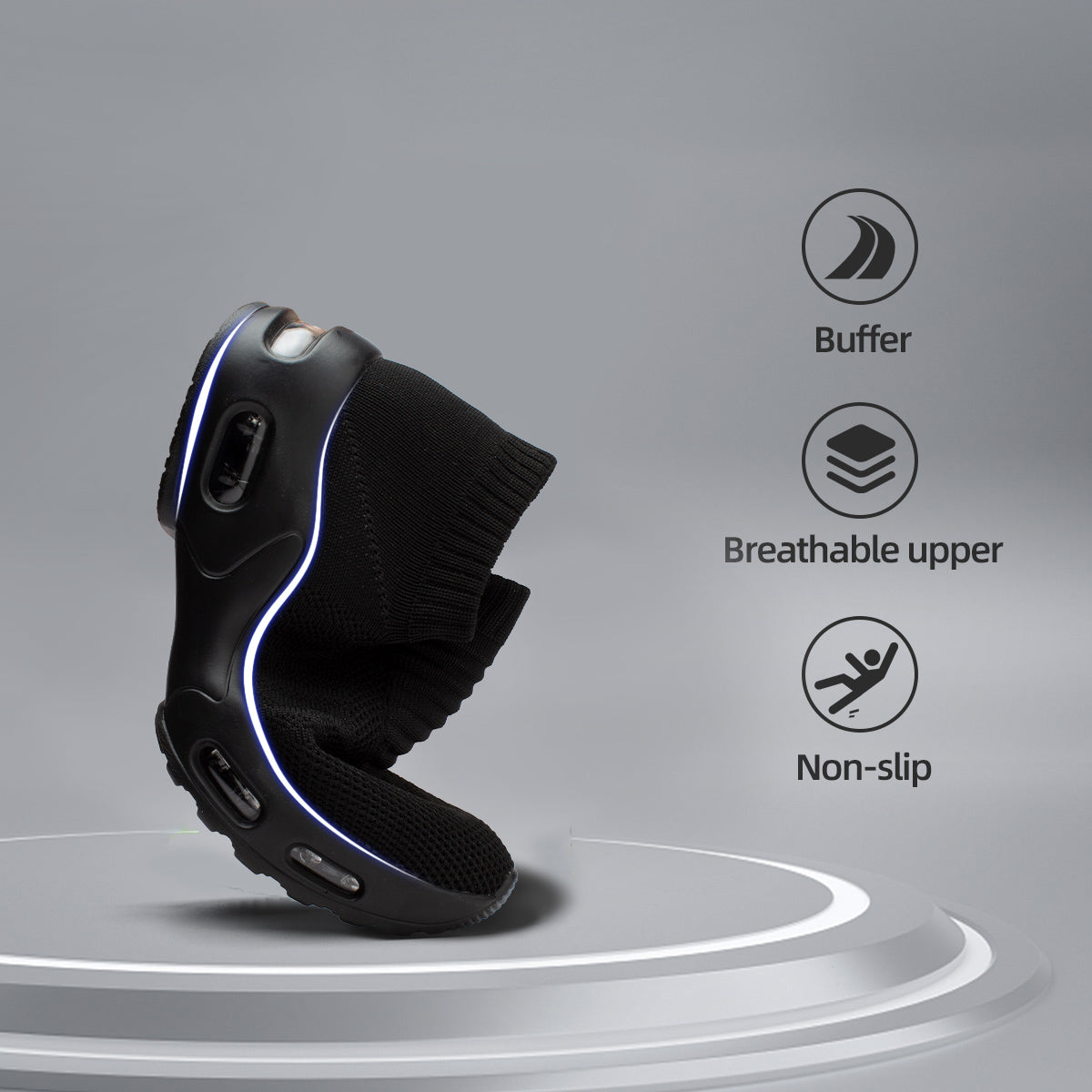 Black shoe with features highlighted on a gray background